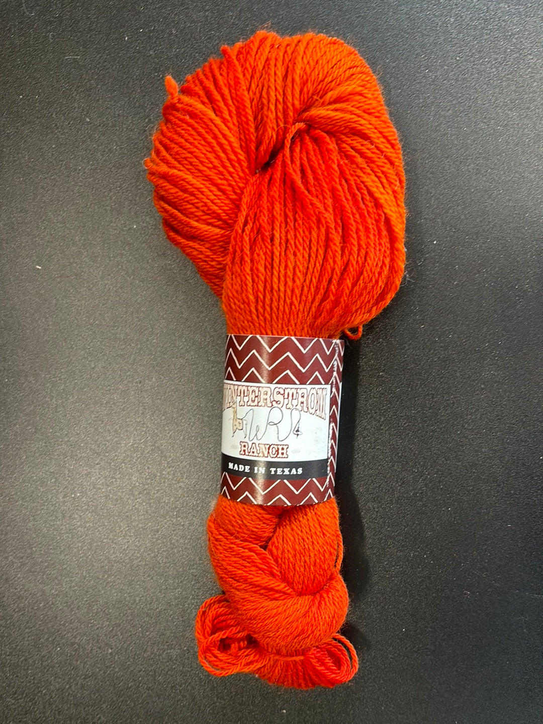 Bright orange yarn