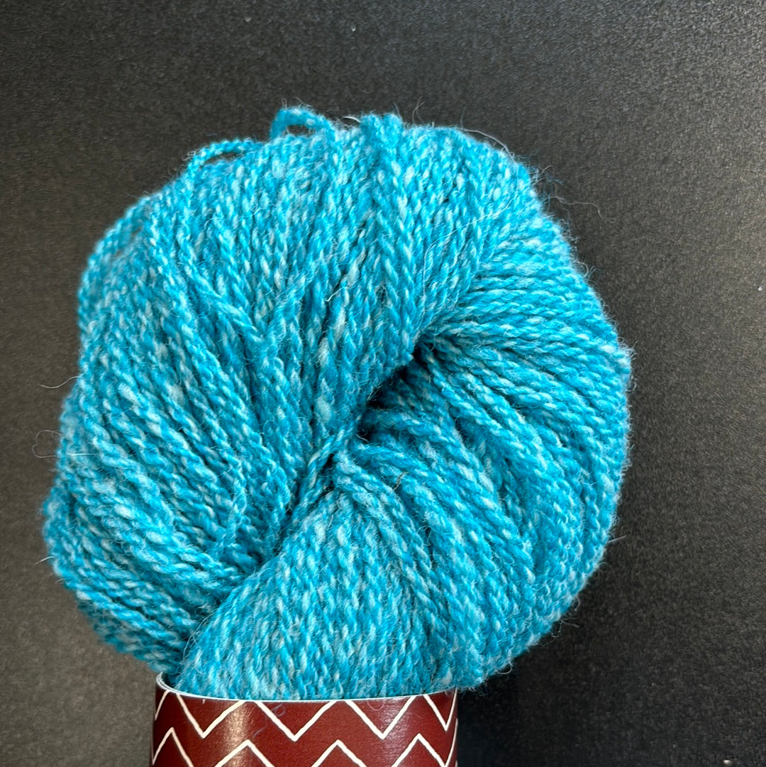 Teal and white yarn
